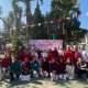 Foto bersama Mahasiswa PPLK FAI UNISMA dan jajaran guru di depan spanduk perayaan HUT RI SMA Islam Nusantara.